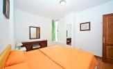Remedios vacation apartments's main bedroom with 2 twin beds
