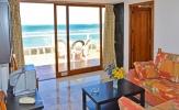 Salon view to sun-terrace and beachfront Apartment 310 Playa Dorada