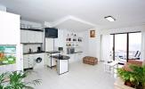 Remedios Family holiday flat's open plan kitchen in salon